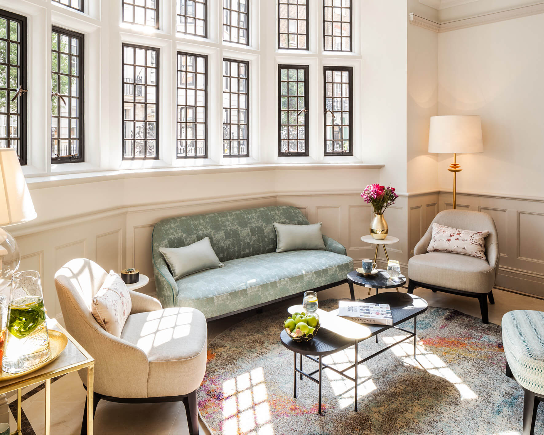 Interior image of one sofa and three chairs at The Evewell Fertility Clinic