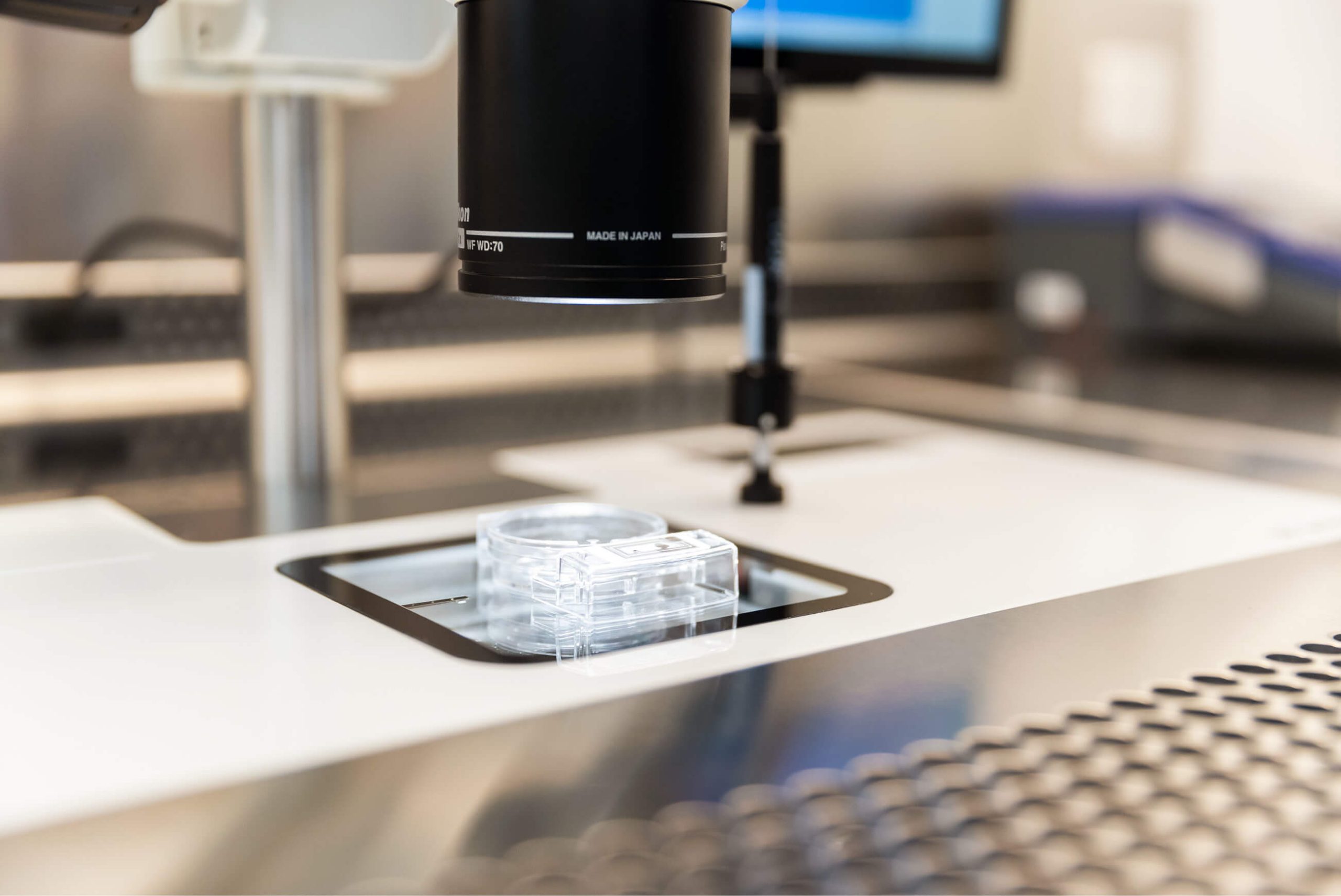 A microscope and testing equipment shown in the Evewell laboratory for IUI treatment